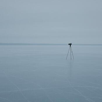 Tripod-based rig with a small board plate above the legs